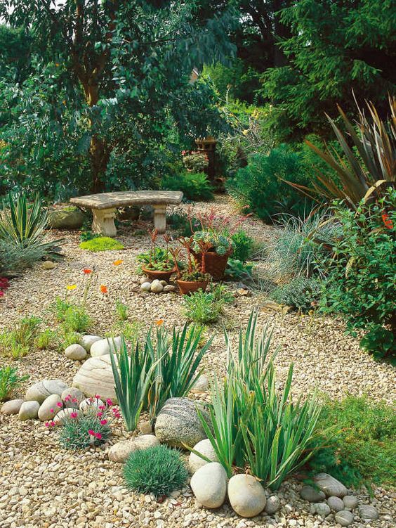amenajarea gradinii cu pietris Pebble garden decoration ideas 23