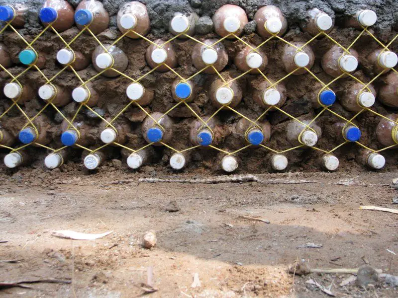 Building a house with plastic bottles